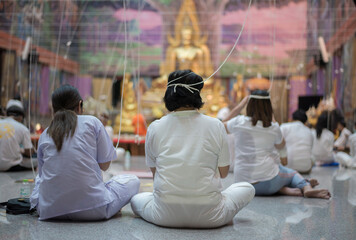 Important religious days in Buddhism, Buddhists gather to perform religious ceremonies.