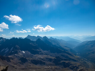 Panoramic view of the majestic mountain ridges of High Tauern seen near Gloedis in Schober group, East Tyrol, Austria, EU. Idyllic high alpine landscape in Austrian Alps. Tranquil serene atmosphere