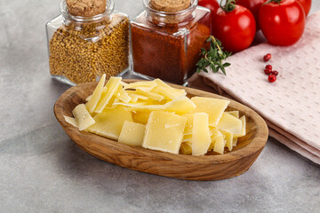 Sliced parmesan cheese in the bowl