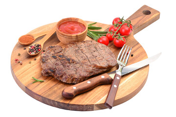 Ribey steak with spices and vegetables on a white background isolated
