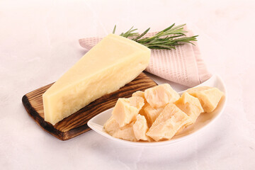 Chopped Italian hard parmesan cheese