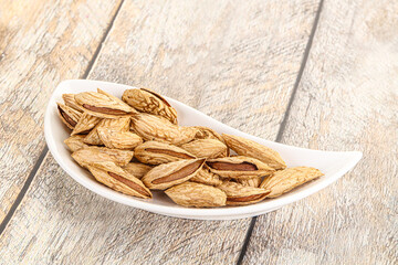 Shelled dry almond nut heap