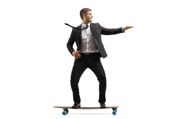 Businessman in a black suit riding a skateboard © Ljupco Smokovski