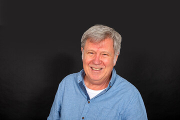 portrait of smiling happy mature man