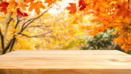 Naklejka na ściany i meble Empty wooden kitchen table over autumn maples background. mock up for design and product display.
