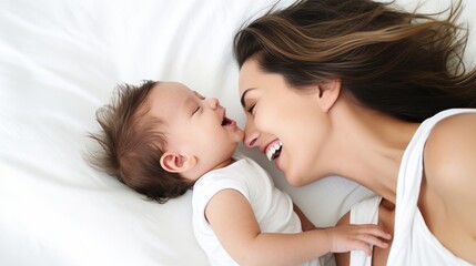 Obraz na płótnie Canvas Joyful Mother and Baby Sharing a Laugh Together.