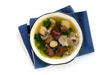 Bowl of pork blood soup on white background.