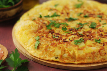 Frittata, traditional egg and potato omelette, Italian dish