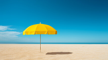 Fototapeta na wymiar A yellow umbrella sitting on top of a sandy beach.