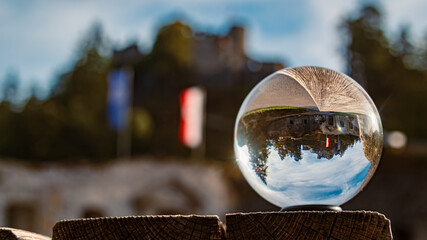 Crystal ball alpine landscape shot at the famous Highline 179 suspension bridge and the Ehrenberg...
