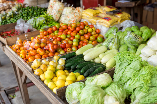 Assortment of fresh vegetables on display at a market in Pangasinan province, showcasing organic food and local produce.