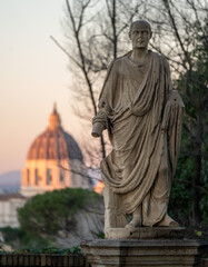 Old statue and dome of saint peter