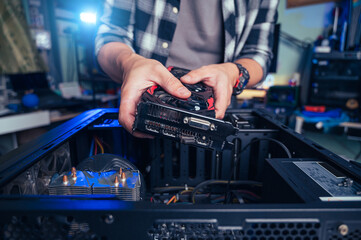 The technician repairing the computer. the concept of computer, CPU, motherboard, hardware,...