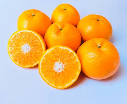 Oranges citrus fruit food fresh ripe juicy whole and halved kinnow raw santra closeup naranja image laranja stock photo