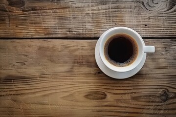 Steaming cup of coffee rich aroma emanating from white porcelain gracefully resting on rustic wooden table symbol of fresh start dark robust espresso contrasts with gentle brown hues of table