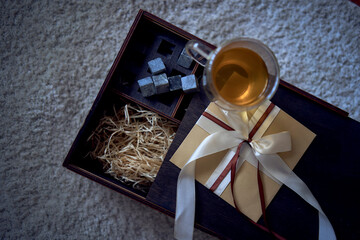 gift certificate on a wooden whiskey box