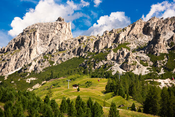 Dolomite alps in Italy, high mountain with green forest