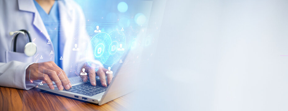 Doctor using AI technology on laptop in office