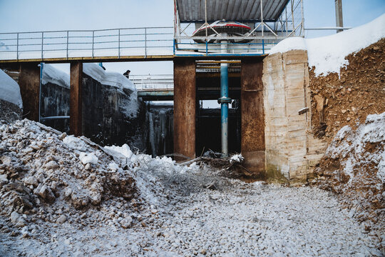 An old dam in a deplorable condition, a destroyed dam, restoration work, repair of watercourse channels.