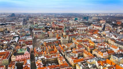 Fototapeta na wymiar Aerial view of Poznań's historic market square in winter.