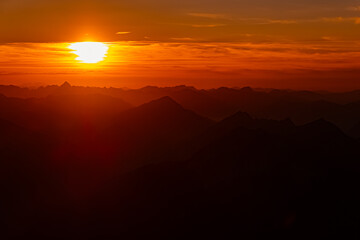 Alpine sunset or sundowner at Mount Zugspitze, Top of Germany, Garmisch-Partenkirchen, Bavaria,...
