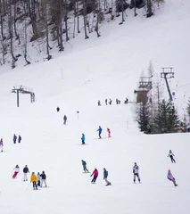 Foto auf Leinwand skiers on resort © Chimzoe Art