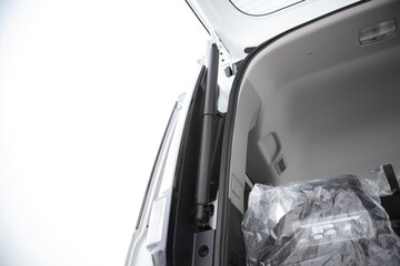 Shock absorber in the trunk of car