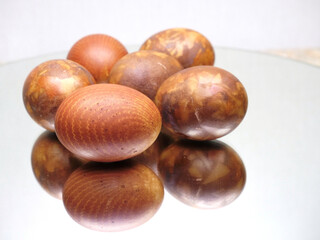 Red colored Easter eggs with marble pattern isolated on white background