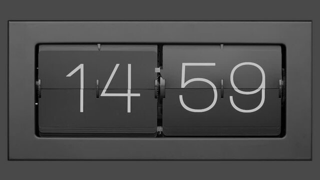 Flip clock quickly flips. Retro flip clock changing from 14:59 to 15:00.. Slow motion. Close up. 