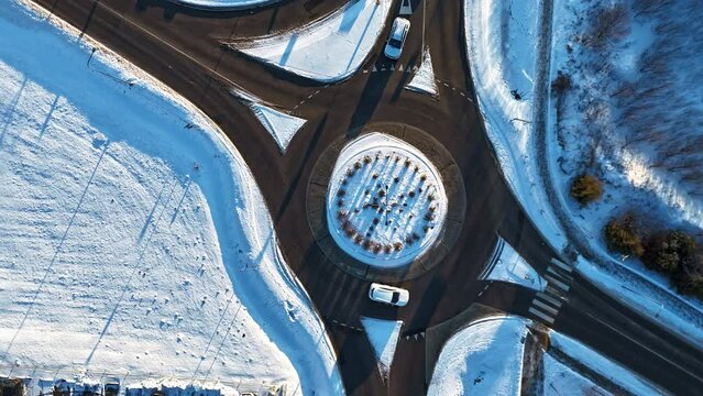 Traffic flow at roundabouts in the city in winter, Silute, Lithuania, Germany