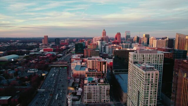 Establisher Aerial Of North Atlanta, Georgia, USA During Sunset. Blue Collars Commuting Home