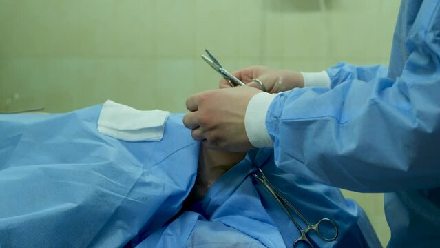 Plaster application on the nose of a patient's girl after endoscopy septoplasty surgery