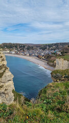 Fototapeta na wymiar Spectacular natural cliffs Aval of Etretat and beautiful famous coastline, Normandy, France