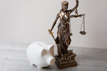 Lady Justice and law books in court