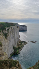 Spectacular natural cliffs Aval of Etretat and beautiful famous coastline, Normandy, France