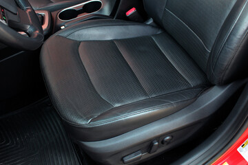 Modern Luxury car inside. Interior of prestige modern car. Comfortable leather seats. Perforated...
