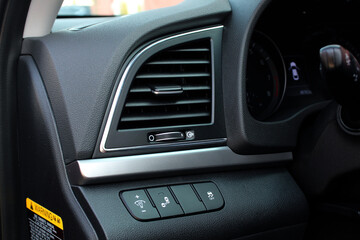 Fototapeta premium Air ventilation car panel. Car air conditioning. Deflectors for driver and passenger. Air ducts on car panel. 