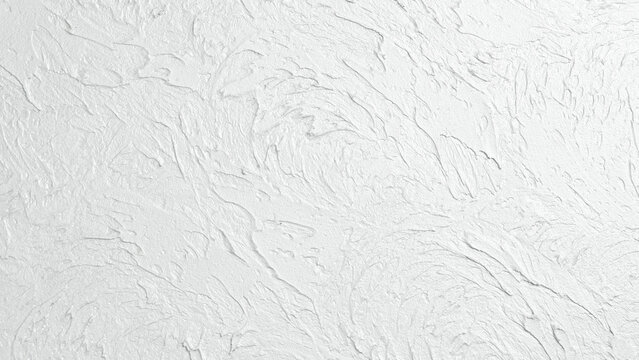 Concrete white background with stone imitation. Top view. Free space for text.