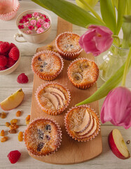 Homemade healthy oat muffins with various fruits