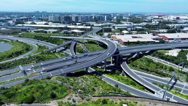 Drone aerial landscape view cars driving over highway freeway underpass bridge in St Peters Marrickville Sydney infrastructure Australia