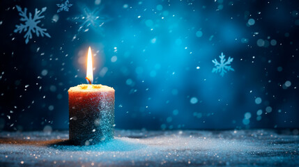 a candle with a candle holder and pine cones in the snow