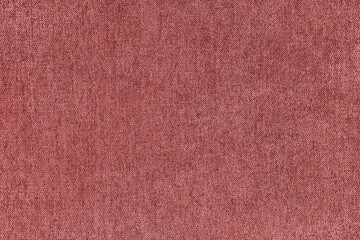 Texture background of velours jacquard red fabric. Upholstery texture fabric, velvet furniture...
