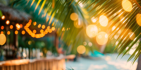 Blurred background blurred beach bar  framed by palm leaves - obrazy, fototapety, plakaty