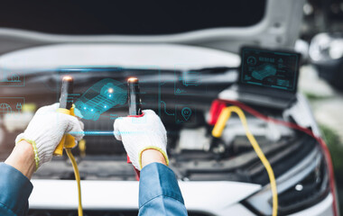 Technician performing advanced diagnostics on an electric vehicle's battery system with augmented reality..
