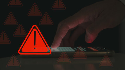 risk and notification error and maintenance concept, user using smartphone with triangle caution warning sign, hacker attacks and hacking data, cyber crime, cyber security, Ransomware, Phishing
