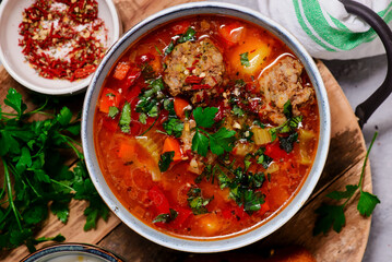 Romanian meatballs sour soup Ciorba de perisoare.style hugge.selective focus