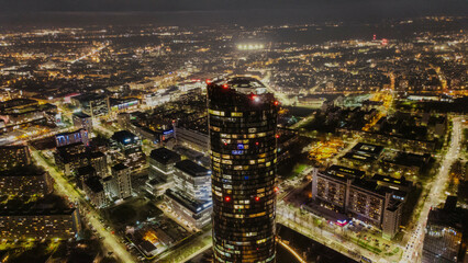Night View of Modern Cityscape: Illuminated Roads & Contemporary Business Architecture - Urban Charm After Dark