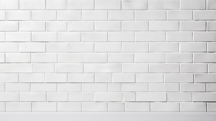 a white brick wall with a black fire hydrant