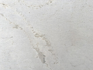 Varied Textures on White Concrete Surface