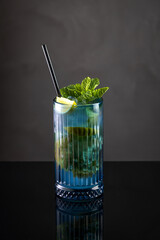 black coffee in a cup on a black background